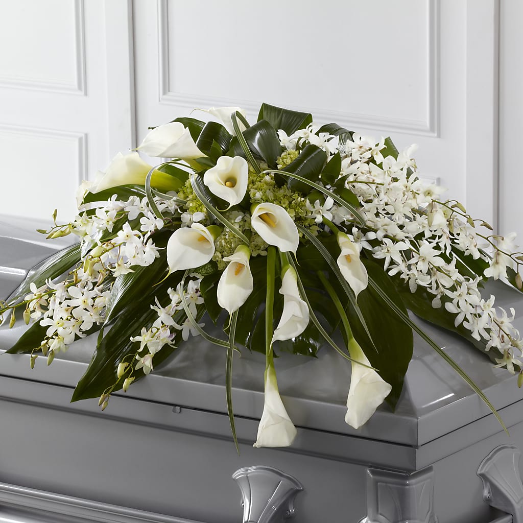 Angel Wings Casket Spray – Hallmark Flower Shoppe, Panama City FL