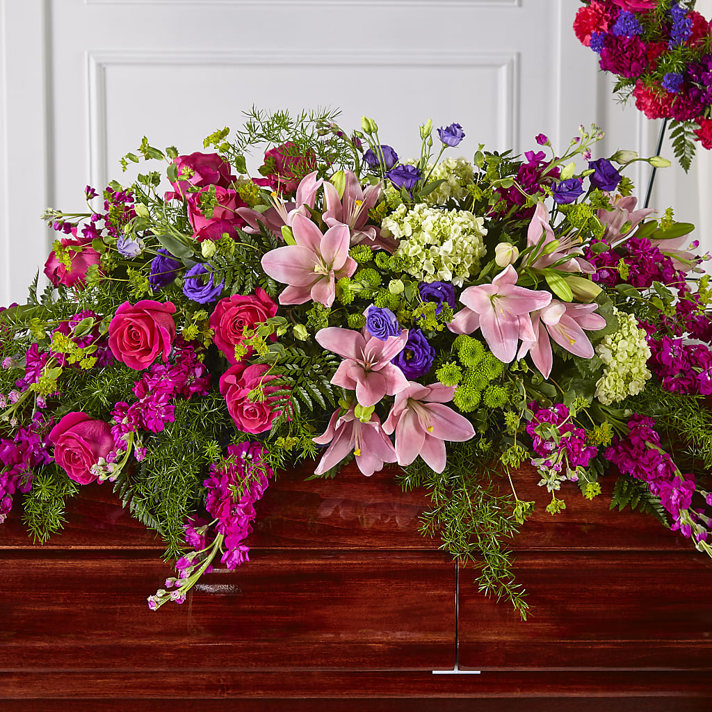 Radiant Tribute Casket Spray – Hallmark Flower Shoppe, Panama City FL
